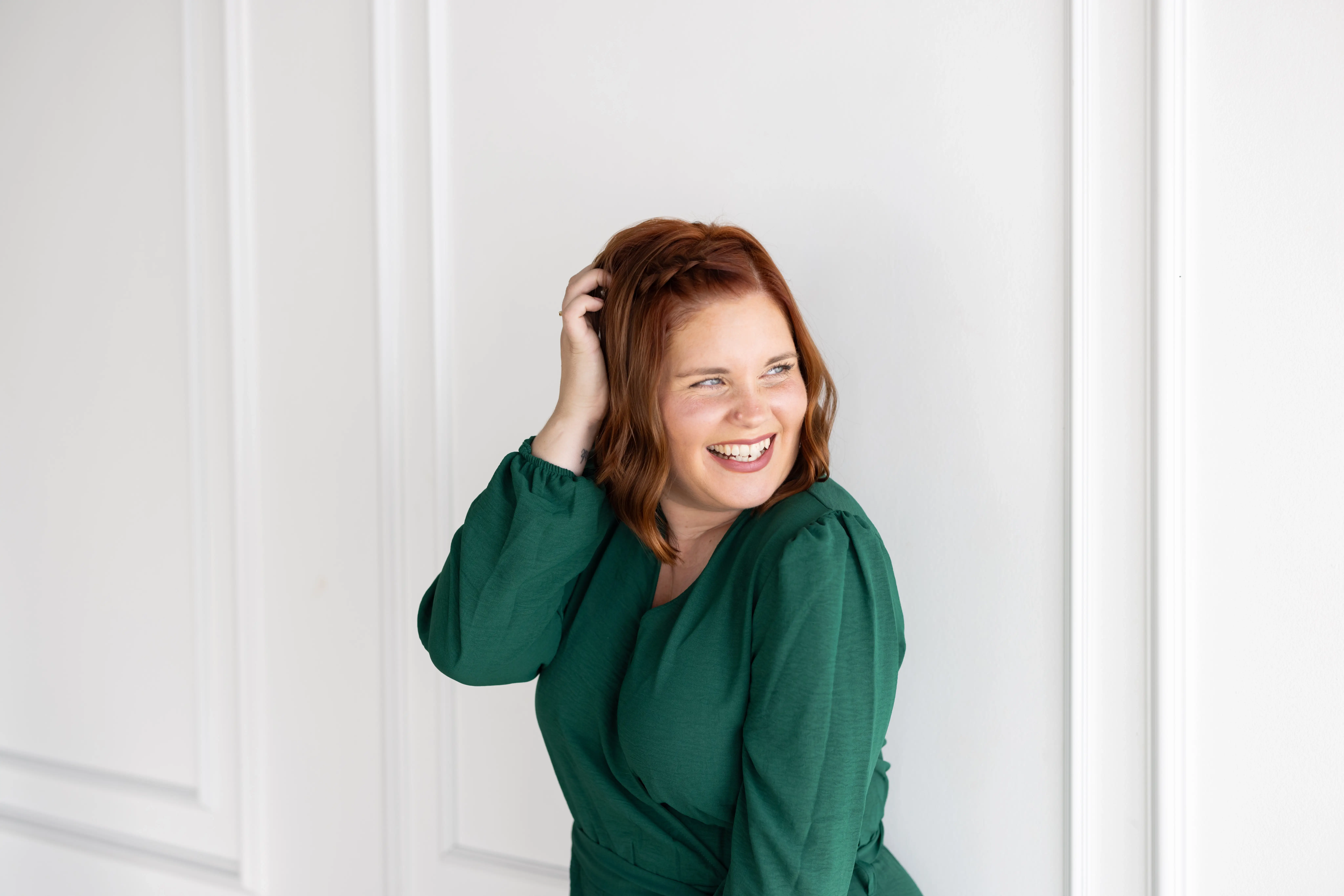 Smiling woman in green dress